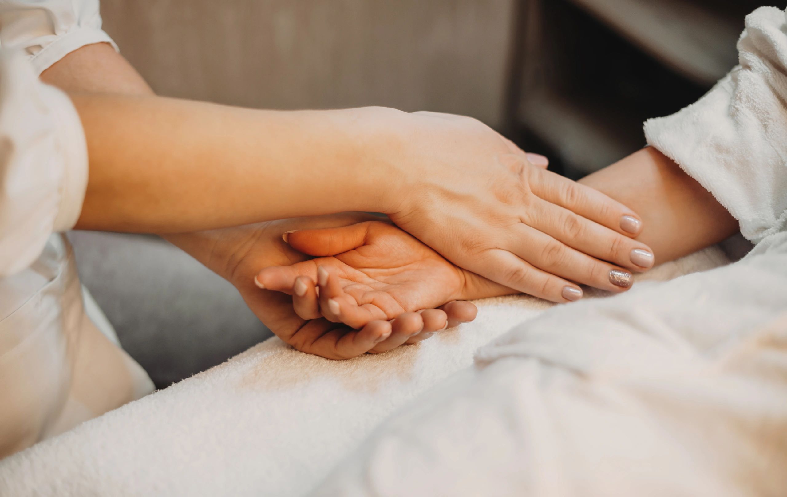 Hands during a spa treatment