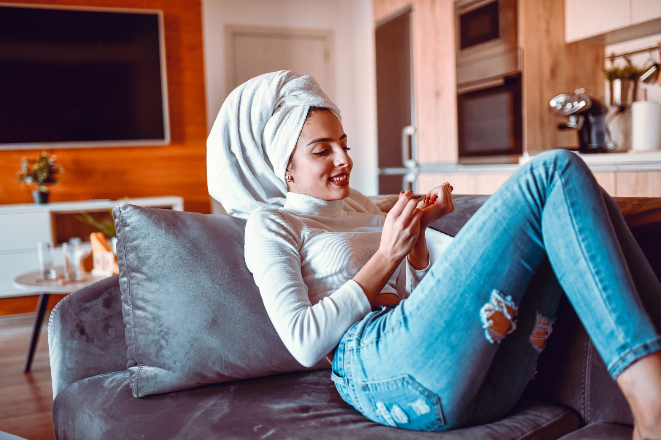 Woman practicing self-care at home
